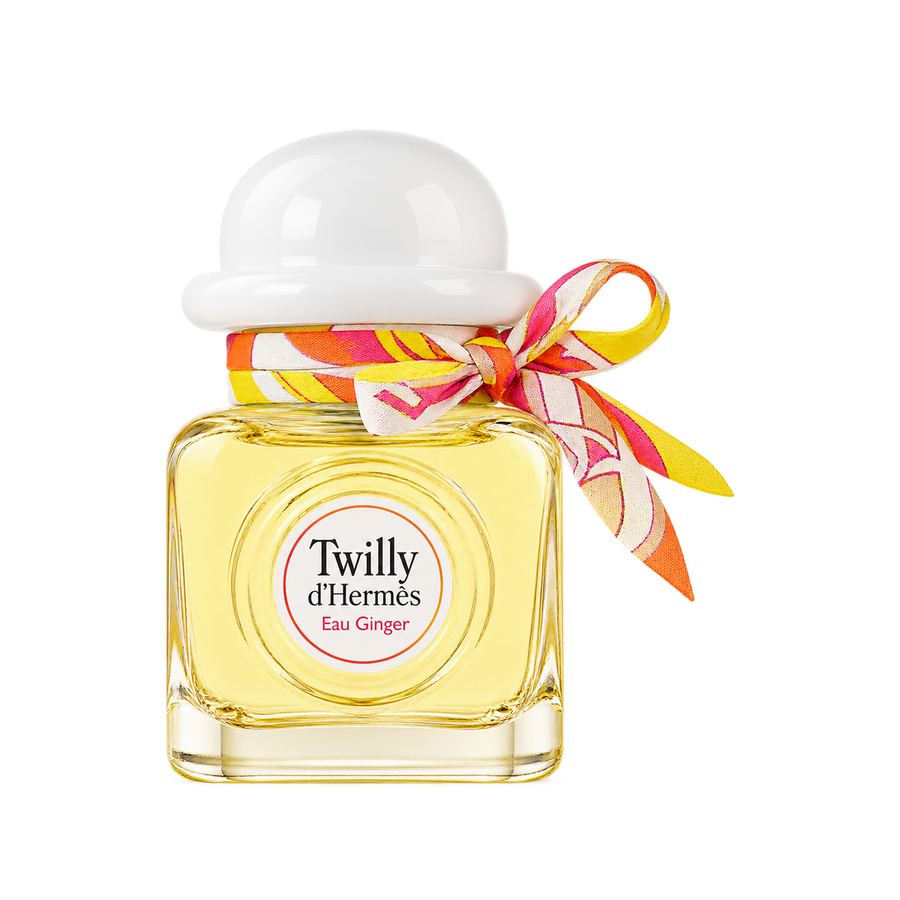 Hermès Twilly Eau Ginger EDP 85ml — upright front-facing bottle, correct white cap, transparent background and balanced scale